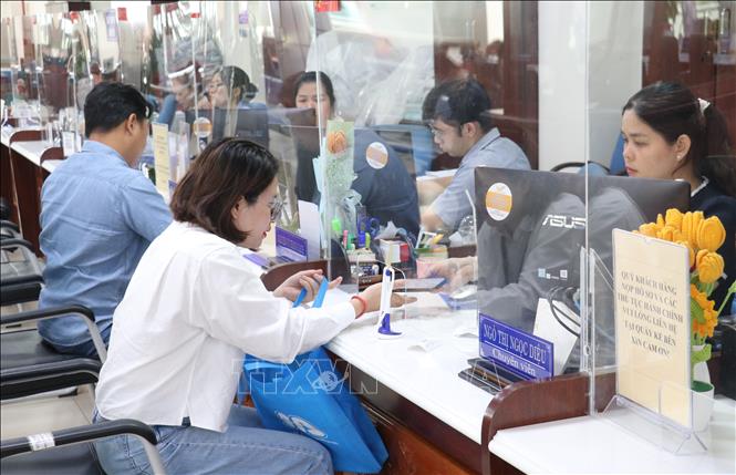 Các Trung tâm Phục vụ hành chính công không ngừng nâng cao chất lượng, hướng tới phục vụ tốt hơn cho người dân và doanh nghiệp. Ảnh: Bùi Giang/TTXVN